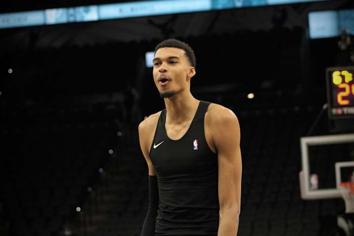 Jan 4, 2024; San Antonio, Texas, USA; San Antonio Spurs forward Victor Wembanyama (1) reacts during warmups prior to facing Giannis Antetokounmpo and the Milwaukee Bucks.